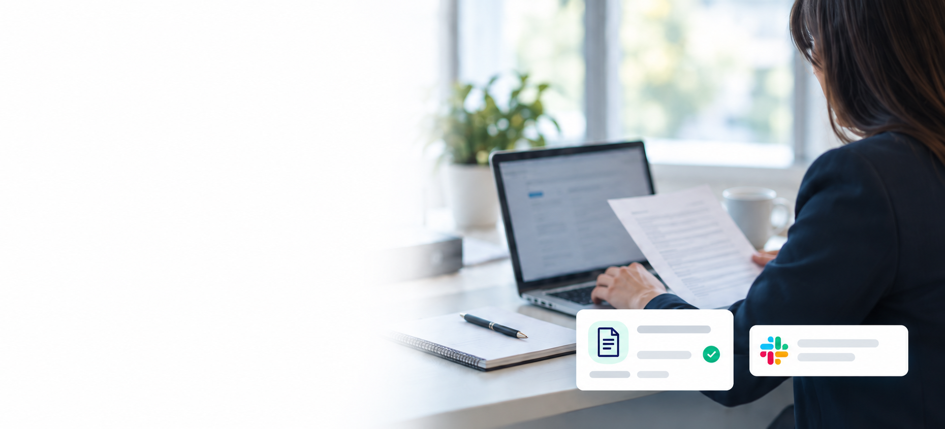 Illustrative professional at a desk reviewing a document beside a laptop; cropped from the approved design concept